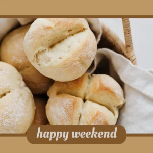 Image of a basket of hard rolls with a brown banner that reads happy weekend.