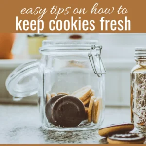 Image of an open glass cookie jar on a countertop with a banner on a brown background that reads easy tips on how to keep cookies fresh.